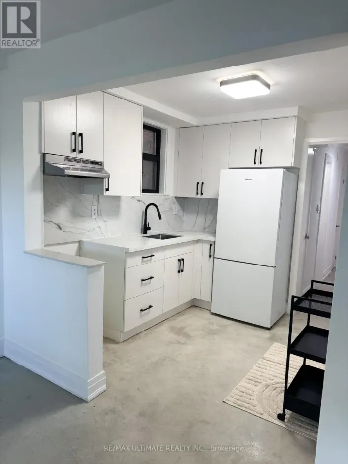 LOWER - 8 CARRINGTON AVENUE, Toronto